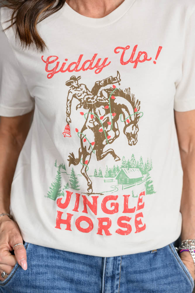 Close of of Jennifer Smith of STS RAnch and 1930 Remnant wearing a t-shirt that says, "Giddy Up Jingle Horse."
