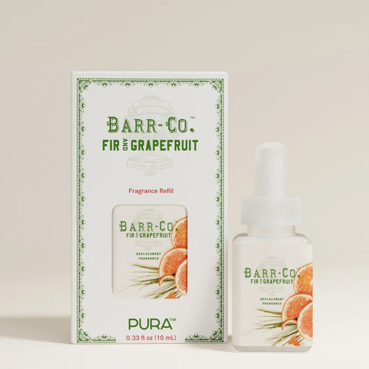Barr-Co. Fir & Grapefruit fragrance refill set, featuring a white box and a small dropper bottle with green text and grapefruit slice illustrations, photographed on a light beige background.