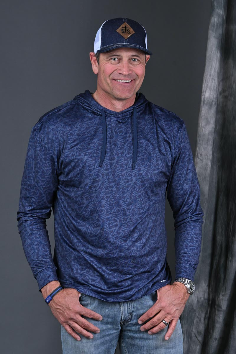 Stran Smith STS Ranch wearing Stars & Stripes Performance Hoodie and STS Ranchwear cap