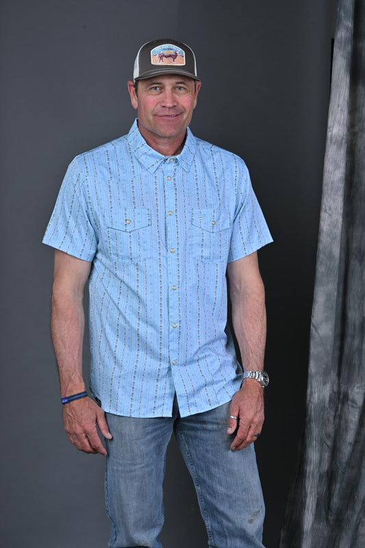 Stran Smith STS Ranch wearing Burlebo Ranch Blue Jean Performance Western Shirt and STS Ranchwear hat