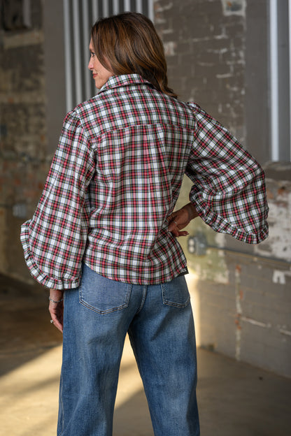 back view of Jennifer Smith of STS Ranch and 1930 Remnant modeling a plaid balloon sleeve top by Ivy Jane