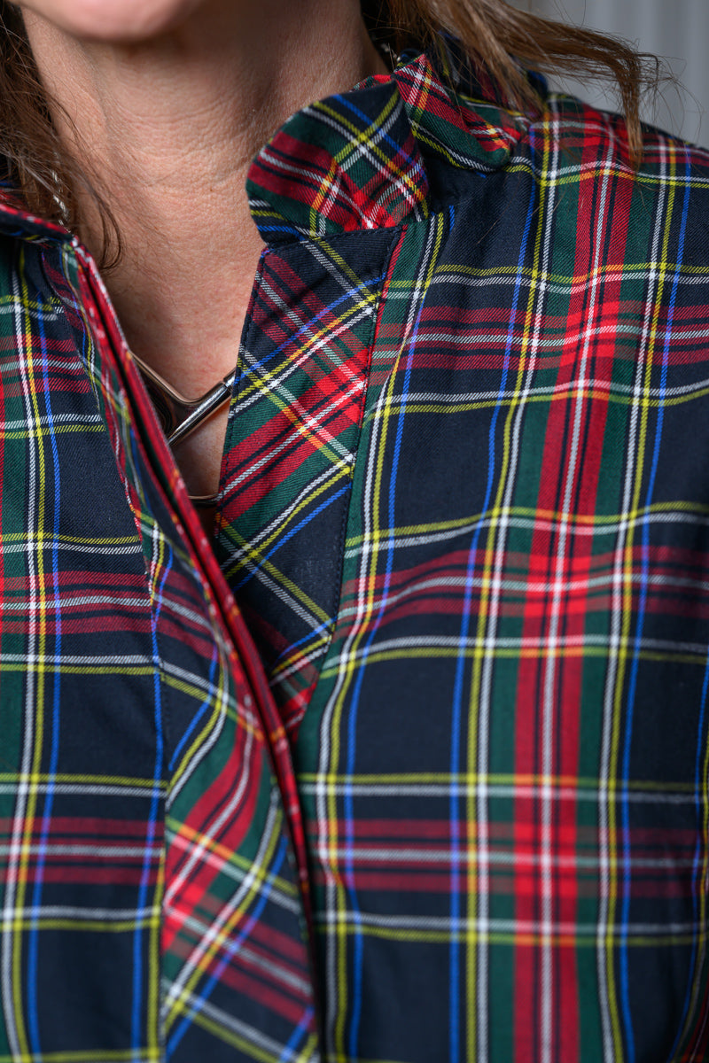 close up of ruffled coller Jennifer Smith of STS Ranch/1930 Remnant wearing a tartan black shirt dress by Ivy Jane
