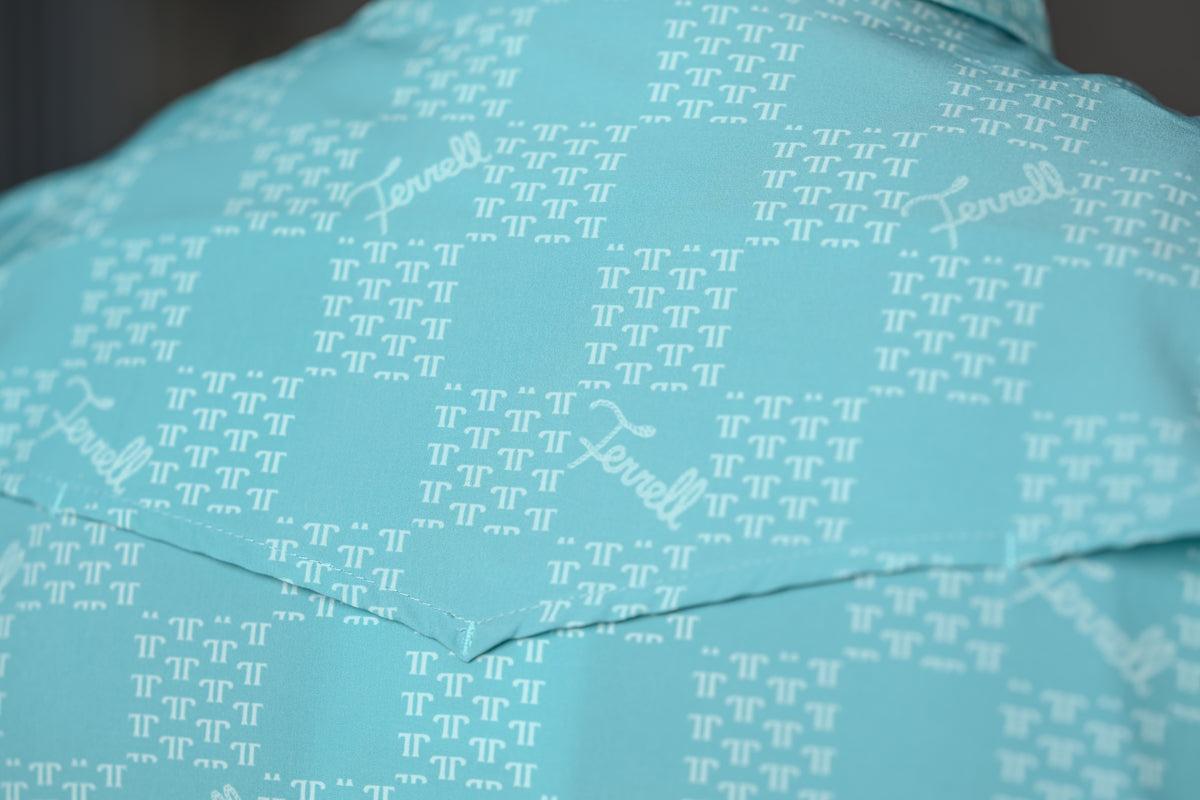 A close-up of a light aqua blue fabric with a repeating white pattern of the letter Pi (π) and the word 'Ferrell' printed across it.