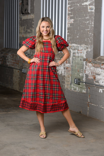 model wearing the JODIFL Red Plaid Ric-Rac Dress – Women's Plaid Statement Dress