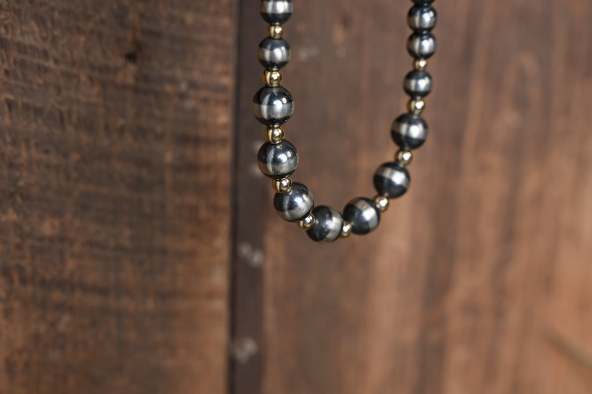 24" Sterling Silver & Gold Graduated Pearls