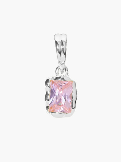 Silver pendant with a pink gemstone on a white background