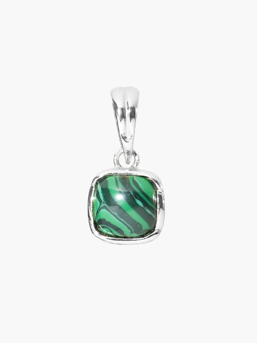 Green marbled stone pendant with silver frame on a white background