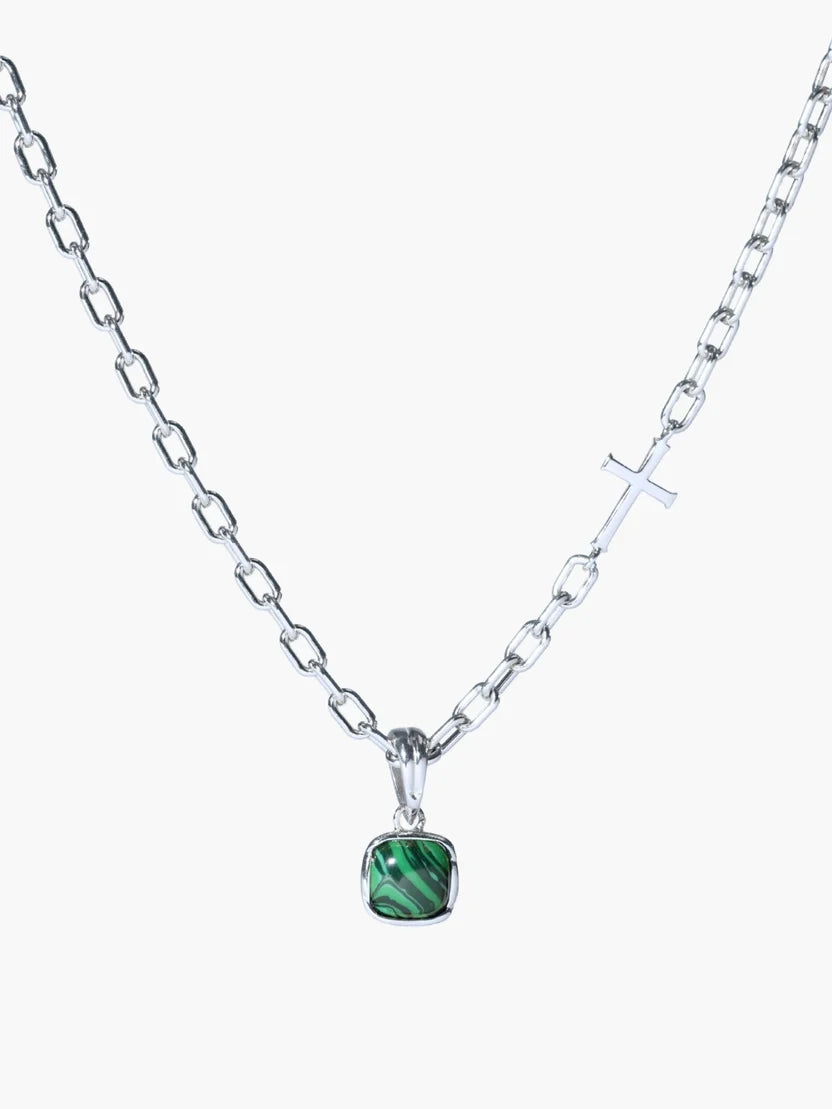 Necklace with a green pendant on a white background