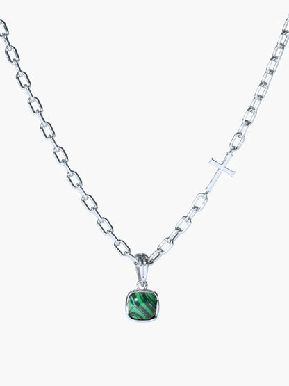 Necklace with a green pendant on a white background