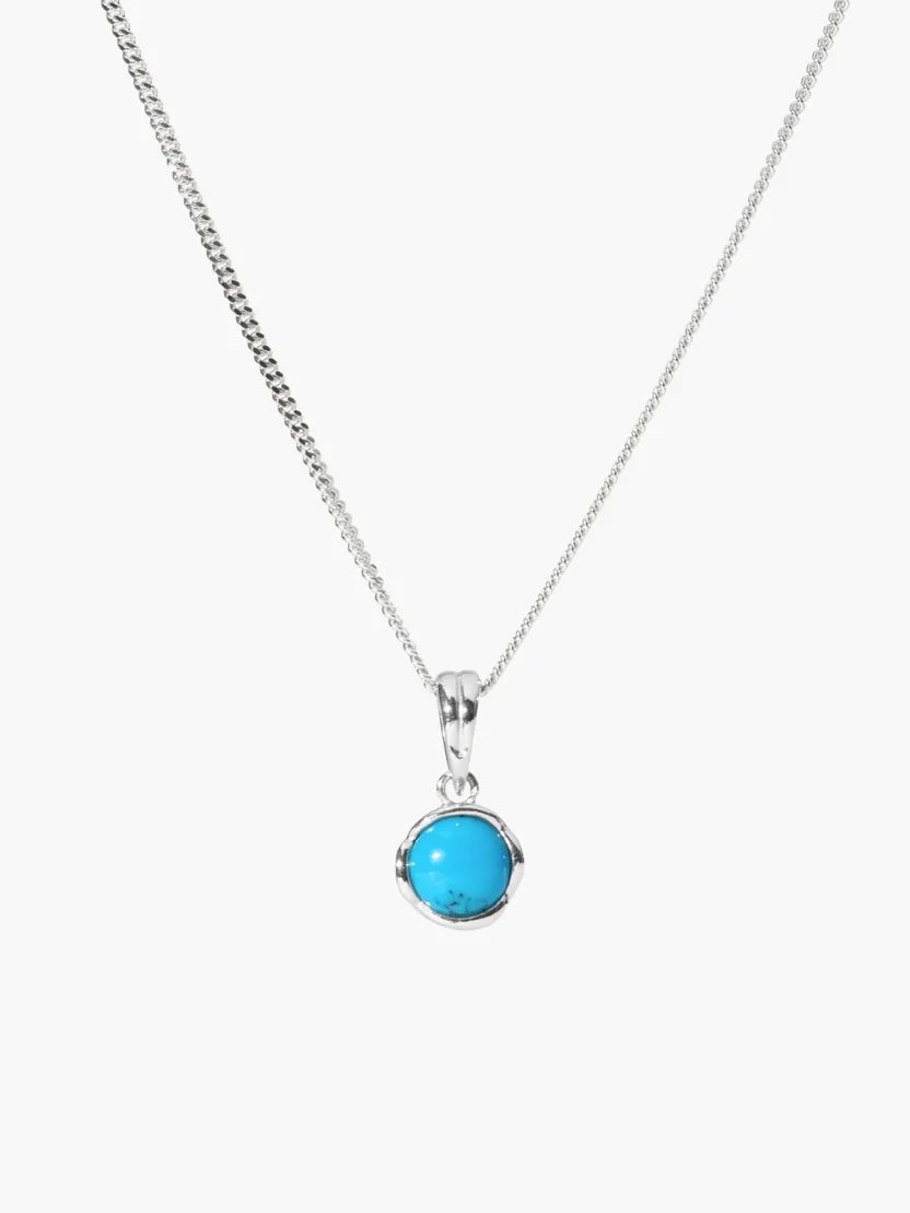 Necklace with a blue pendant on a white background