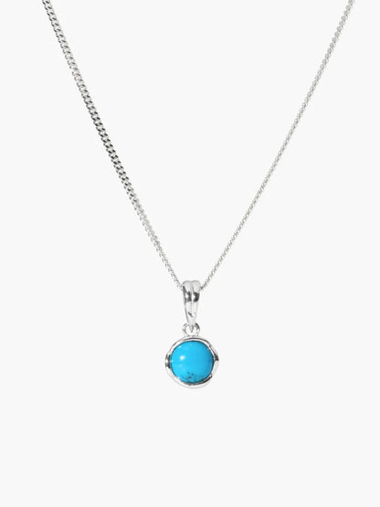 Necklace with a blue pendant on a white background