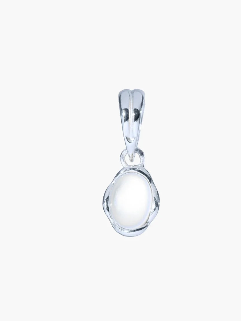 Silver pendant with a clear stone on a white background