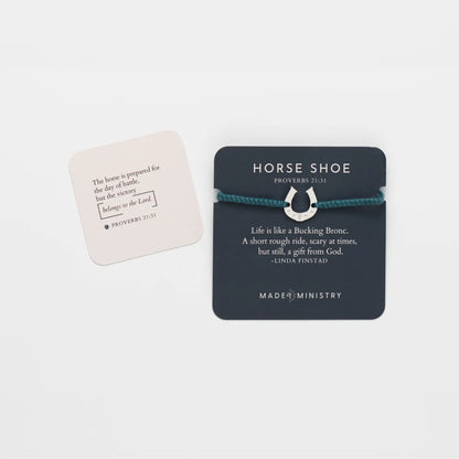 Two small cards with text and a horseshoe design on a white background