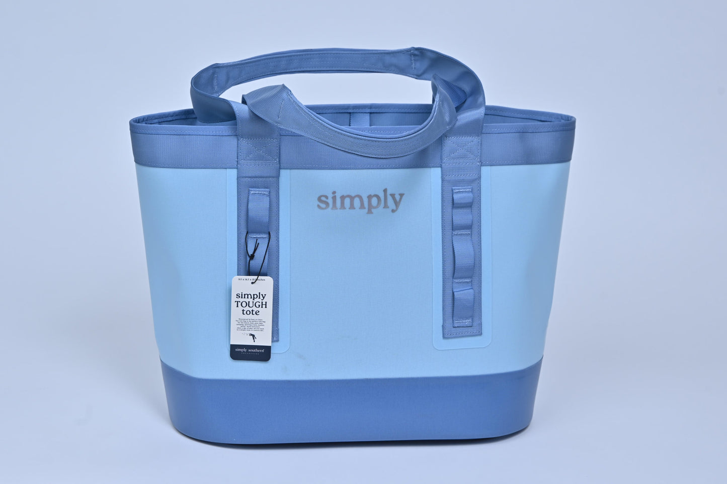 Blue tote bag with 'simply' branding on a light gray background