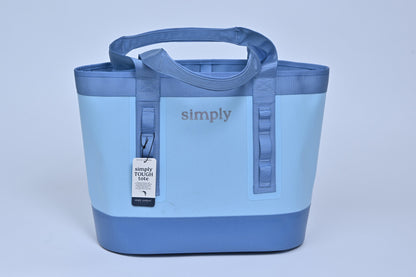Blue tote bag with 'simply' branding on a light gray background