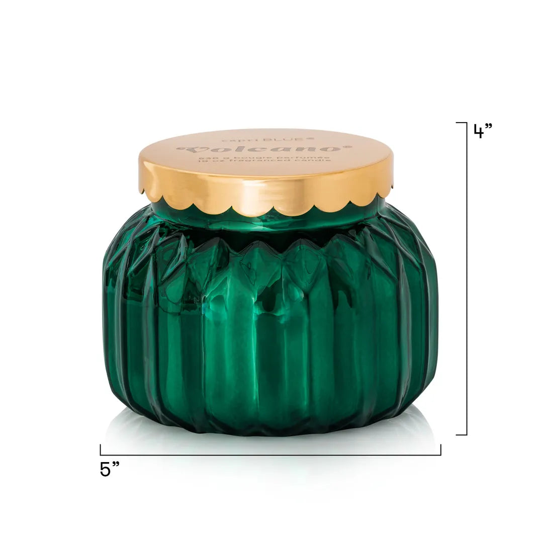 A green faceted glass jar candle with a gold scalloped lid, shown on a white background with dimension lines indicating 5 inches wide and 4 inches tall.