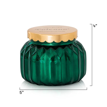 A green faceted glass jar candle with a gold scalloped lid, shown on a white background with dimension lines indicating 5 inches wide and 4 inches tall.