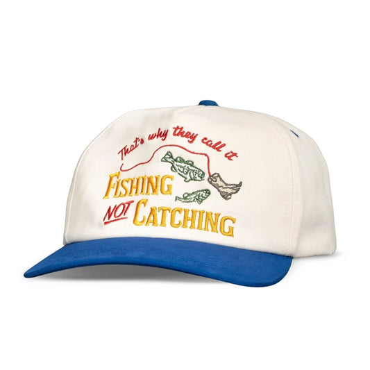 Cap with 'Fishing Not Catching' text and fish illustrations on a white background