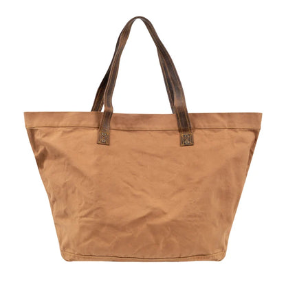Brown tote bag with leather handles on a white background
