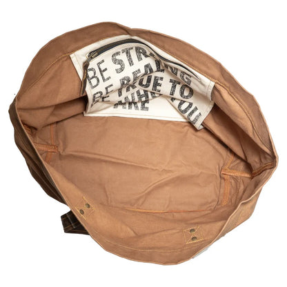 Brown leather jacket with a white interior label on a white background