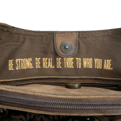 quote "Be Strong, Be Real, Be True to Who You Are." inside STS Ranchwear Cowhide Josie Satchel Jennifer Smith STS Ranch