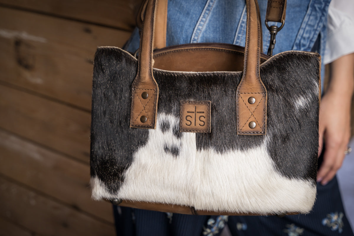 quote "Be Strong, Be Real, Be True to Who You Are." inside STS Ranchwear Cowhide Josie Satchel Jennifer Smith STS Ranch