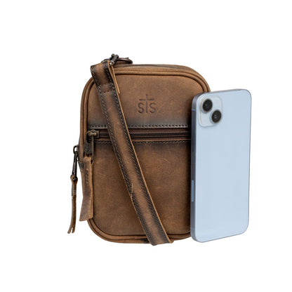 STS Ranchwear Baroness Auzlyn Leather Crossbody Bag Jennifer Smith STS Ranchwear back product image next to phone for size comparison