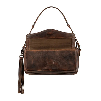 A dark brown leather shoulder bag with a front flap pocket, a top handle, and a long tassel charm, shown against a plain white background.
