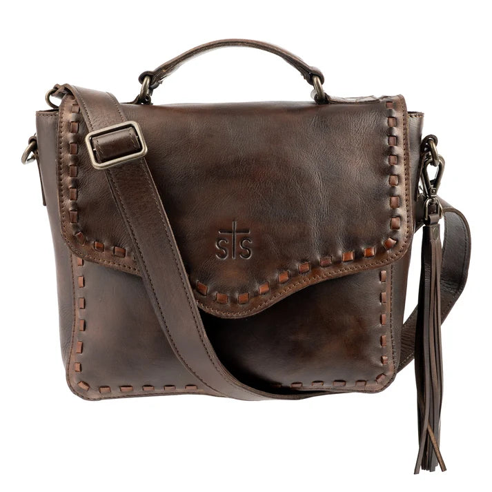 A dark brown leather shoulder bag with a top handle, adjustable crossbody strap, decorative stitching, and a tassel detail, shown against a plain white background.