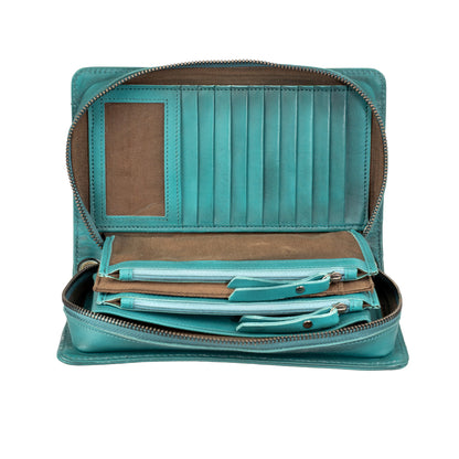 Open turquoise Evie Organizer with fold-out panel, clear ID window, card slots and interior zip compartments designed by Jennifer Smith STS Ranch