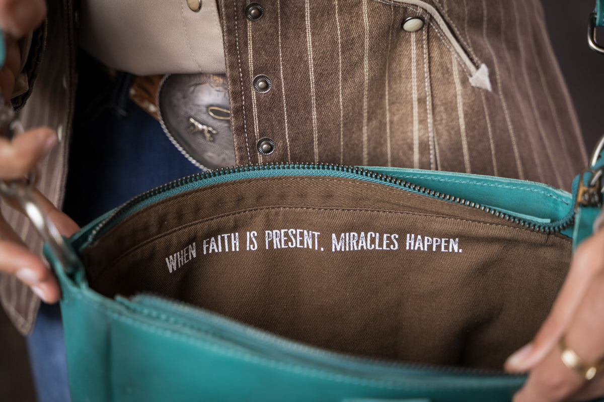 STS Ranchwear Wayfarer turquoise Olivia crossbody interior quote