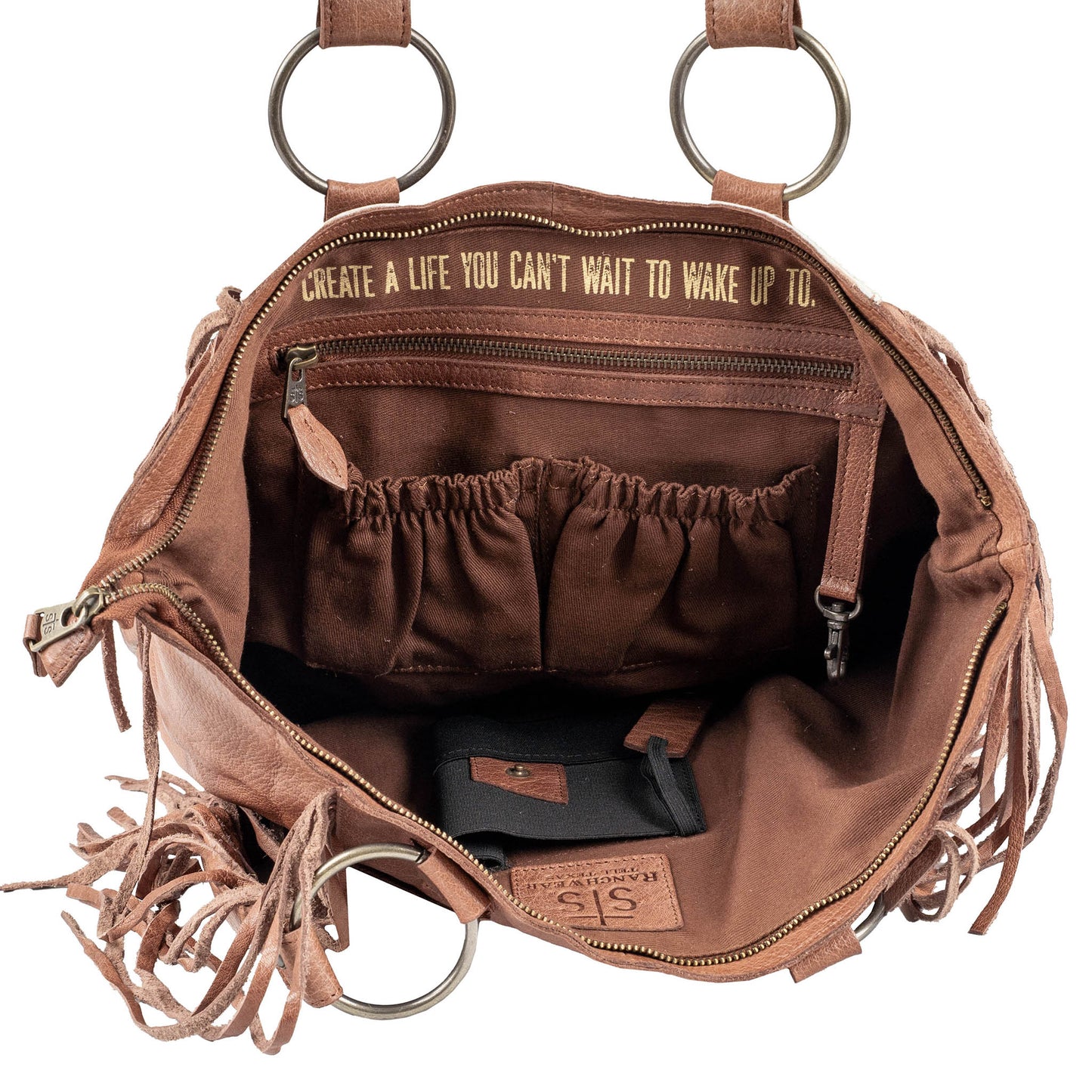 Interior organization pockets inside STS Ranchwear Indie Cowhide Tote