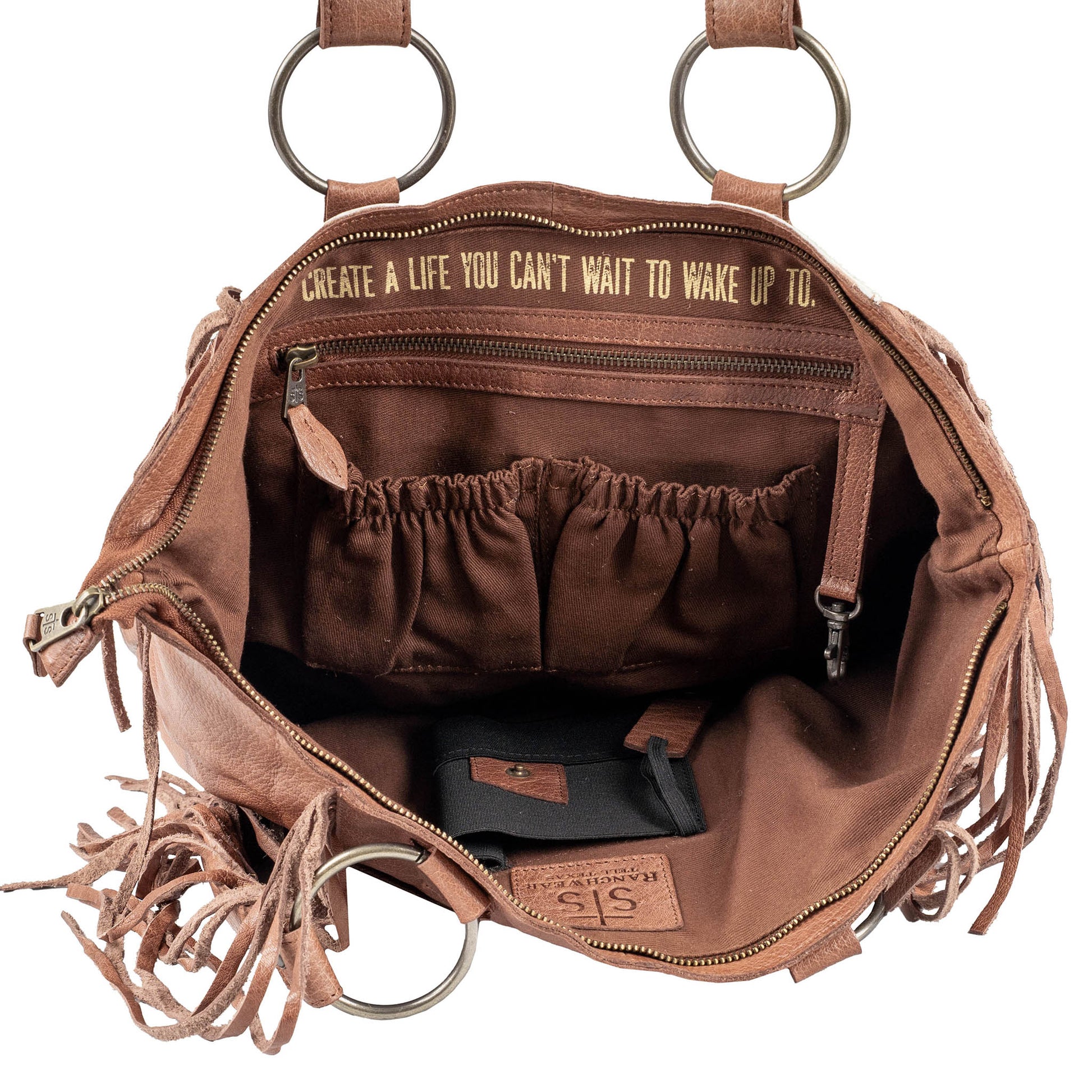 Interior organization pockets inside STS Ranchwear Indie Cowhide Tote