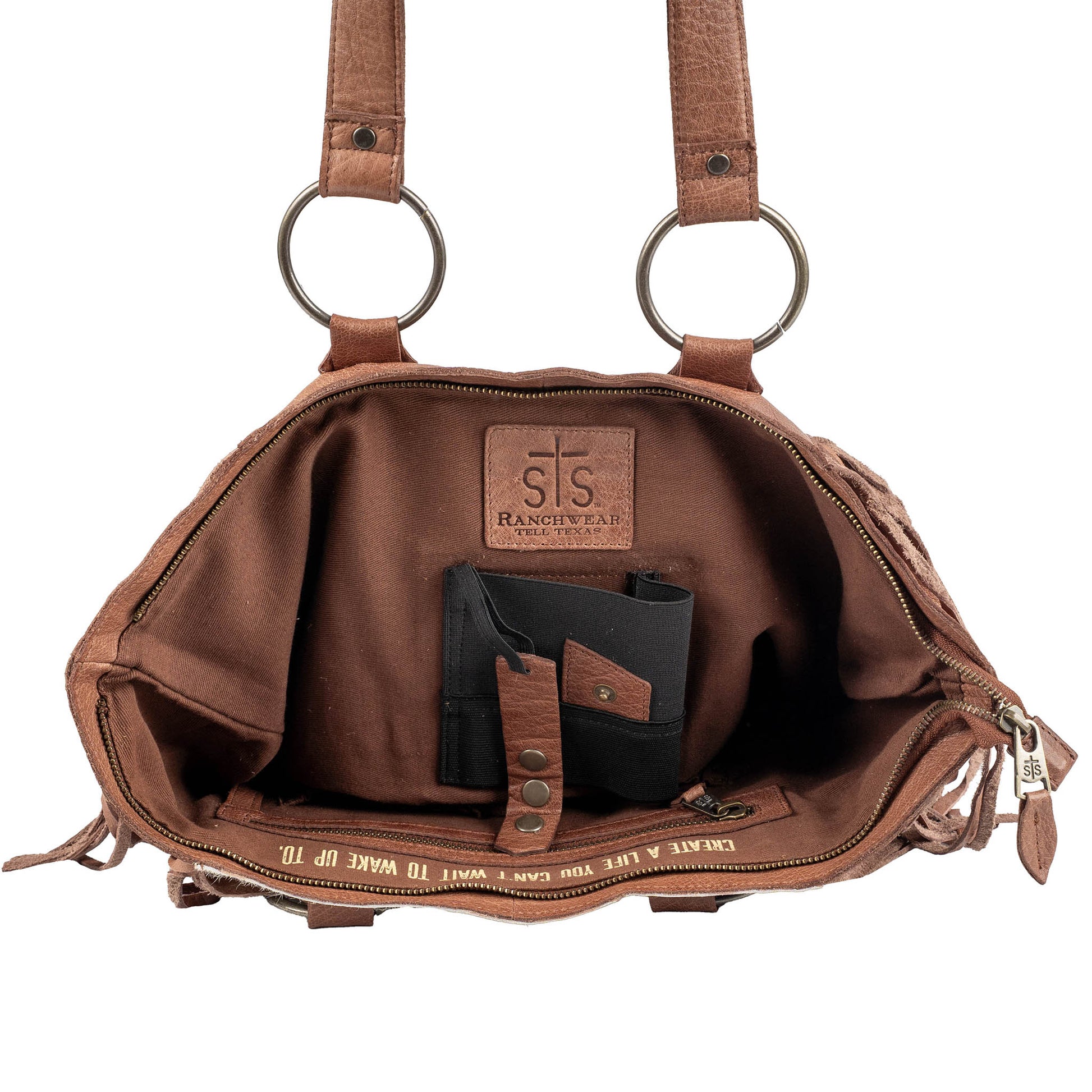 Interior organization pockets inside STS Ranchwear Indie Cowhide Tote concealed carry pocket