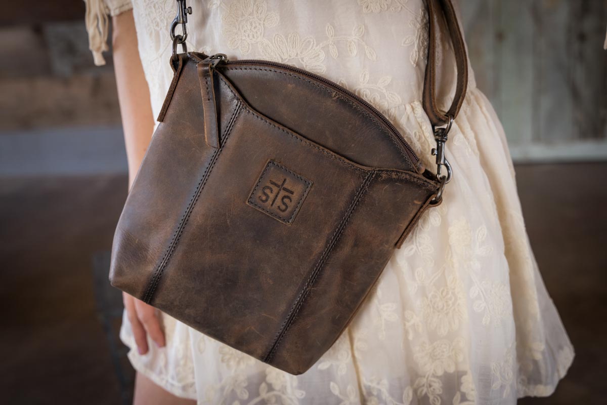 STS Ranchwear Baroness Olivia distressed leather crossbody bag Jennifer Smith STS Ranch lifestyle image close up