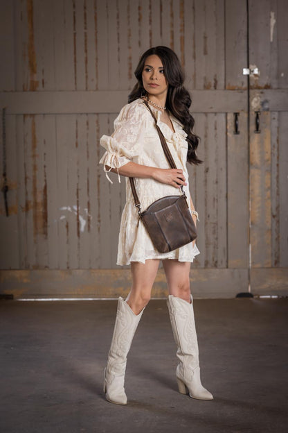 STS Ranchwear Baroness Josie  distressed leather crossbody bag Jennifer Smith STS Ranch lifestyle image