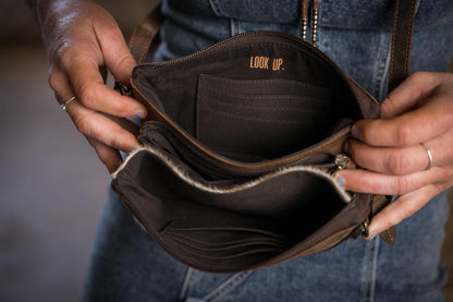 Inside view of the Cowhide Rio Crossbody Bag with 8 card slots and zip storage Jennifer Smith STS Ranch