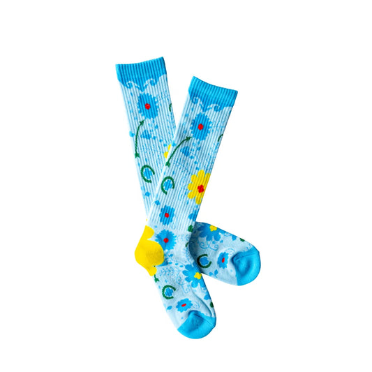 Colorful socks with floral design on a white background