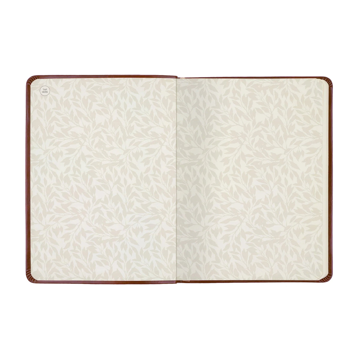 An open notebook or journal with cream-colored patterned pages and a dark brown leather cover, shown flat against a white background.