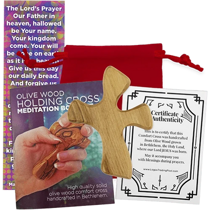 Olive wood holding cross meditation box set with a red drawstring pouch, wooden cross, certificate of authenticity, and a colorful prayer card on a white background.
