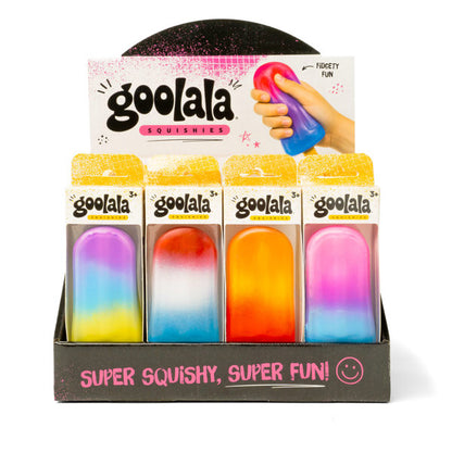A retail display box of Goolala Squishies, showing four colorful, squishy foam stress toys in different gradient designs (purple/yellow/blue, red/white/blue, orange/yellow/blue, pink/blue) with a hand holding one toy visible on the cardboard header.